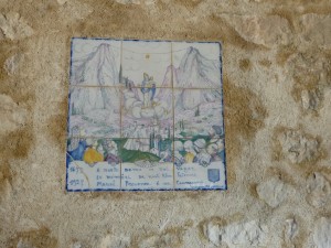 Tile in the church in Provençal language